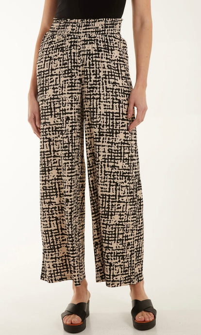 BLACK AND CREAM SHIRRED WAISTBAND WIDE LEG PRINTED TROUSERS