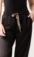 Load image into Gallery viewer, BLACK LEOPARD BOW CUFFED JOGGERS