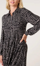 Load image into Gallery viewer, BLACK AND WHITE GEO SWIRL SHIRRED BUTTON STRETCH DRESS